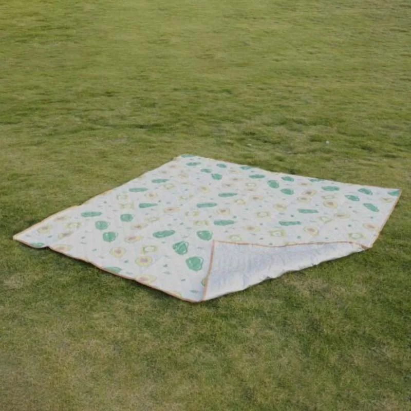 Picnic mat pictured for the camping mat thickness guide